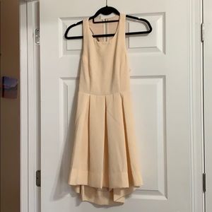 Light Creme colored open backed dress